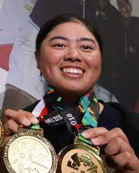 Saso with her two gold medals she won at the 2018 asian games. Yuka Saso Wikipedia