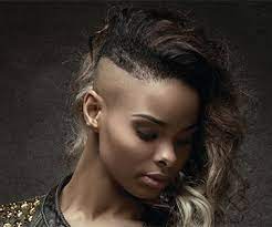 The brown and blonde balayage is enhancing the shape of the feathers. Side Cut Hair Tips And Tricks For Wearing The Trend