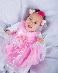 Portrait Of A Cute Newborn Baby Girl In A Pink Dress Stock Photo Picture And Royalty Free Image Image 91182899