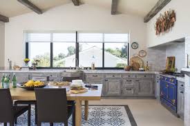 Indoor Outdoor Kitchen Exposed Beams With Blue La Cornue And Inset Tile Floor By Cooper Pacific Kitche Kitchen Interior Indoor Outdoor Kitchen Outdoor Kitchen