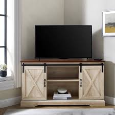 Consider a corner unit with storage cabinets or drawers to house entertainment devices, electronics, or consoles. Corner Tv Stands Tv Stands Entertainment Centers Target