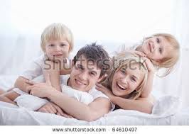 Home Shoot Family On White Bed In The Bedroom Medical Tourism Family Photo Cards Life Plan