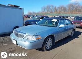 Image result for Light Ice Blue 2007 Town Car