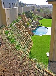 Pools Patio Solutions For Steep Sloping Properties Terraforce Retaining Walls Landscaping Retaining Walls Concrete Retaining Walls Patio Solutions