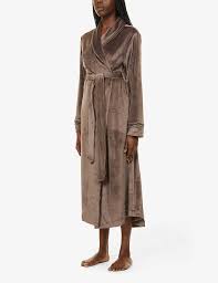 It's the perfect blend of 2000s nostalgia and the skims collection and its accompanying campaign would feel apropos at any point in the last two. Skims Velour Belted Stretch Velour Robe Selfridges Com