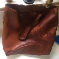 How To Fix A Water Stain On Leather Wonder If It Works Clean Leather Purse Water Stains Leather Cleaning