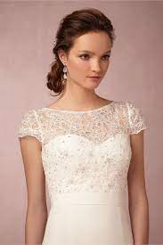European designers and couture collections may offer something beyond the popular dresses offered by many united states shops. Wraps Lace Toppers And Cover Ups For The Bride