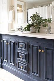 Hi friends,in this diy, i'm sharing how i painted our bathroom vanity cabinets without doing any sanding. Coastal Bathroom Makeover Finding Silver Pennies Painted Vanity Bathroom Painted Vanity Dark Vanity