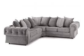 An l shaped couch is a traditional sized sofa that also includes a chaise lounge, which makes it the perfect addition for a living room that requires a lot of seating. Chingford Grey Fabric L Shape Corner Sofa Furnitureinstore