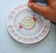 This Baby Tooth Album Is A Nice Way To Display And Save Baby Teeth 31 Products Every Parent Of A Growing Child Will W Baby Teeth Baby Gadgets Grown Children