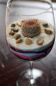 Birds And The Bees Lyrics Schoolboy Easy Diy Cactus Terrarium In A Wine Glass A Little Bit Of Desert With Some Sand Art And A Full Step By St Glass Cactus Cactus Terrarium Succulent Centerpieces