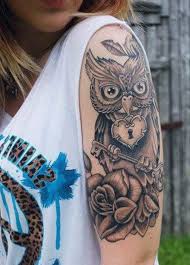 Attractive black ink owl tattoo on right arm. 35 Attractive Owl Tattoo Ideas For Creative Juice
