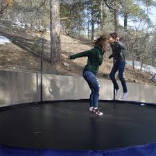 Many people ask themselves, how can i jump higher on a trampoline. i have a few tips that can help you adjust something as simple as your positioning as you continue to jump on the trampoline you will soon realize it is so much fun that you want to try bouncing higher. Skywalker 15 Foot Trampoline Review Sturdy And Affordable