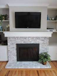 how to whitewash a fireplace brick fireplace makeover fireplace remodel painted brick fireplaces