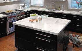 These white kitchen cabinet design ideas with black countertops provide a vintage look to your kitchen. Five Ways To Embrace Black And White