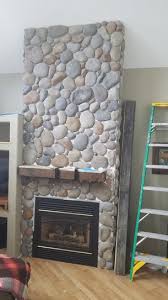 River rock veneer panels will enhance any project with their natural finishes and realistic texture. Veneerstone River Rock Mendocino Flats 10 Sq Ft Handy Pack Manufactured Stone 97543 The Home Depot River Rock Fireplaces Rock Fireplaces Manufactured Stone