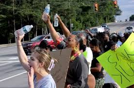 Community protests after Rick Chow ...