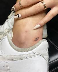 Here are the coolest tattoos to inspire you. Chic Ankle Tattoos That Are Are Tiny But Mighty