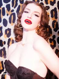 Discover Vintage Glamour and Bold Style with Micheline Pitt's Vixen Fashion
