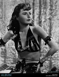 BARBARA STANWYCK in LADY OF BURLESQUE, 1943, directed by WILLIAM A.  WELLMAN. Copyright UNITED ARTISTS. Custome by Edith Head. - Album alb434643