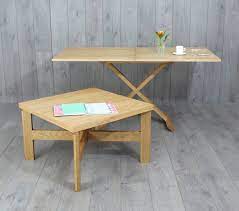 Furnish your kitchen with a minimalist table, like the rustic cintra counter table. Oak Convertable Eco Coffee Table To Dining Table By Griffin And Sinclair Notonthehighstreet Com