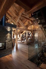 Charpente Meleze Et Cheminee En Pierre Luzerne Chalet Meribel Chalets Bayrou Maison Ossature Bois Chalet Meribel Deco Chalet Montagne