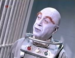 With the sub standard outfit and the director's choice of, “breaking the  bubble” for this particular shot suggests that this is Otto Preminger who  played Mr. Freeze in the second season of