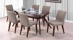 Pick a winner of a surface with the bravo dining table. Wesley Persica Leatherette 6 Seater Glass Top Dining Table Set Urban Ladder