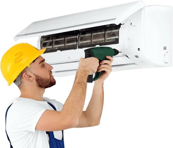 Certified HVAC technician on the job in a hard hat