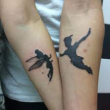 Tinkerbell and peter pan are recognised by all. There S No Better Way To Prove Your Endless Love Than With Matching Tattoos But What About S Disney Couple Tattoos Matching Disney Tattoos Couple Tattoos Love