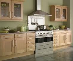 Lovely Muted Green Walls And Pine Kitchen Cabinets I D Love This For My Kitchen So Fresh But Beech Kitchen Cabinets Kitchen Decor Trends Kitchen Renovation