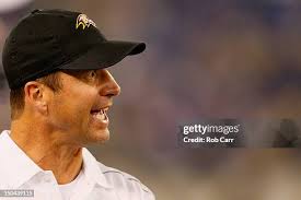 Baltimore Ravens wide receiver Dorian Graham makes a cut to avoid the...  News Photo