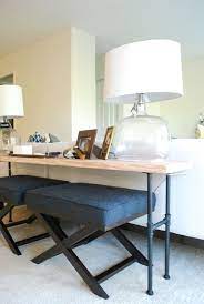Stack the pallets together, after you painted them, and fling the sofa on top. Brass Jones Diy Industrial Sofa Back Table Diy Sofa Table Industrial Sofa Table Diy Sofa