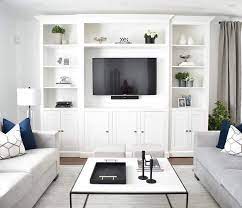 Large living room boasting elegant leather. The 50 Best Entertainment Center Ideas Home And Design