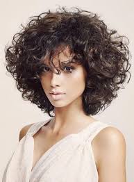 Don't be afraid of layers! Hairstyles For Curly Hair Medium Length