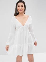 The blousy bodice sits above a tiered mini skirt that flares slightly. 22 Off 2021 Double V Neck Long Sleeve Tiered Mini Dress In White Zaful