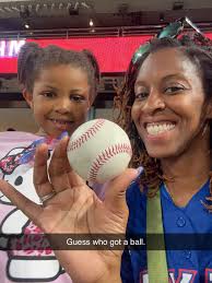 We are having a blast at Hello Kitty night. First time at a game that I  caught a ball. If you see me
