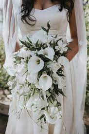 You can apply for mixing different types of such flowers in different color. 57 Innocently Beautiful White Bridal Bouquets Weddingomania