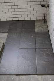 I found exactly what i was looking for at lowe's and didn't have to go to a tile specialty store. What S The Best Tile Layout For My Bathroom Straight Or Staggered Dark Tile Floors Floor Tile Design Tile Layout