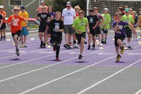 West reigns in city grade school track meet