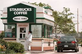 A Car Pulls Up To A Dual Window Stand Alone Walk Up And Coffee Stands Drive Thru Coffee Pull Ups