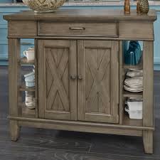 Sitting round the island to keep the when you're considering your kitchen island design it's important to think carefully about how you will use your kitchen island and choose the. Home Styles Mountain Lodge Kitchen Island In Gray Nebraska Furniture Mart