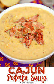 Slow Cooker Cajun Potato Soup Easy Potato Soup Jazzed Up With Cajun Seasoning And Andouille Sausage Frozen Ha Potato Soup Easy Cooker Recipes Cajun Potatoes