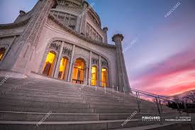 Hours may change under current circumstances Usa Illinois Chicago Evanston Bahai Temple Illuminated Temple Against Moody Sunset Sky Traveling Outdoors Stock Photo 194918494