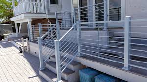 Balcony in modern house in sunset. Exterior Railings Compass Iron Works