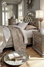 Love This Glam Bedroom Sophisticated Shades Of Beige Silver And Ivory Combine To Create Ashley Bedroom Furniture Sets Bedroom Furniture Sets Silver Bedroom