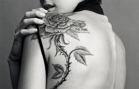 A rose tattoo with thorns symbolizes sacrifice. What Does Thorn Tattoo Mean Represent Symbolism