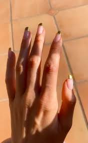 Kendall Jenner S Gold Update To The Classic French Manicure Is Surprisingly Wearable Kendall Jenner Nails Colored French Nails Colored Nail Tips