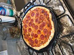 First Try At Home Made Pizza On The Lodge Cast Iron Pizza Stone Need To Pre Cook The Dough A For A Few Minutes Before Toppings Next Time Around Castiron