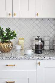When you tile a backsplash, you'll be using three materials: White Glazed Porcelain Arabesque Backsplash Tile Backsplash Com